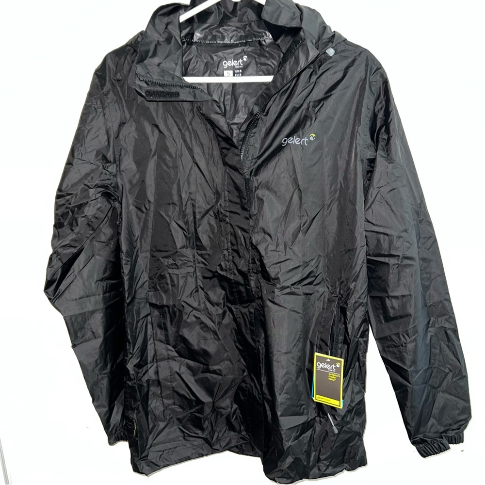 Gelert Stormlite 5000 Men's Packaway Rain Jacket. NWT